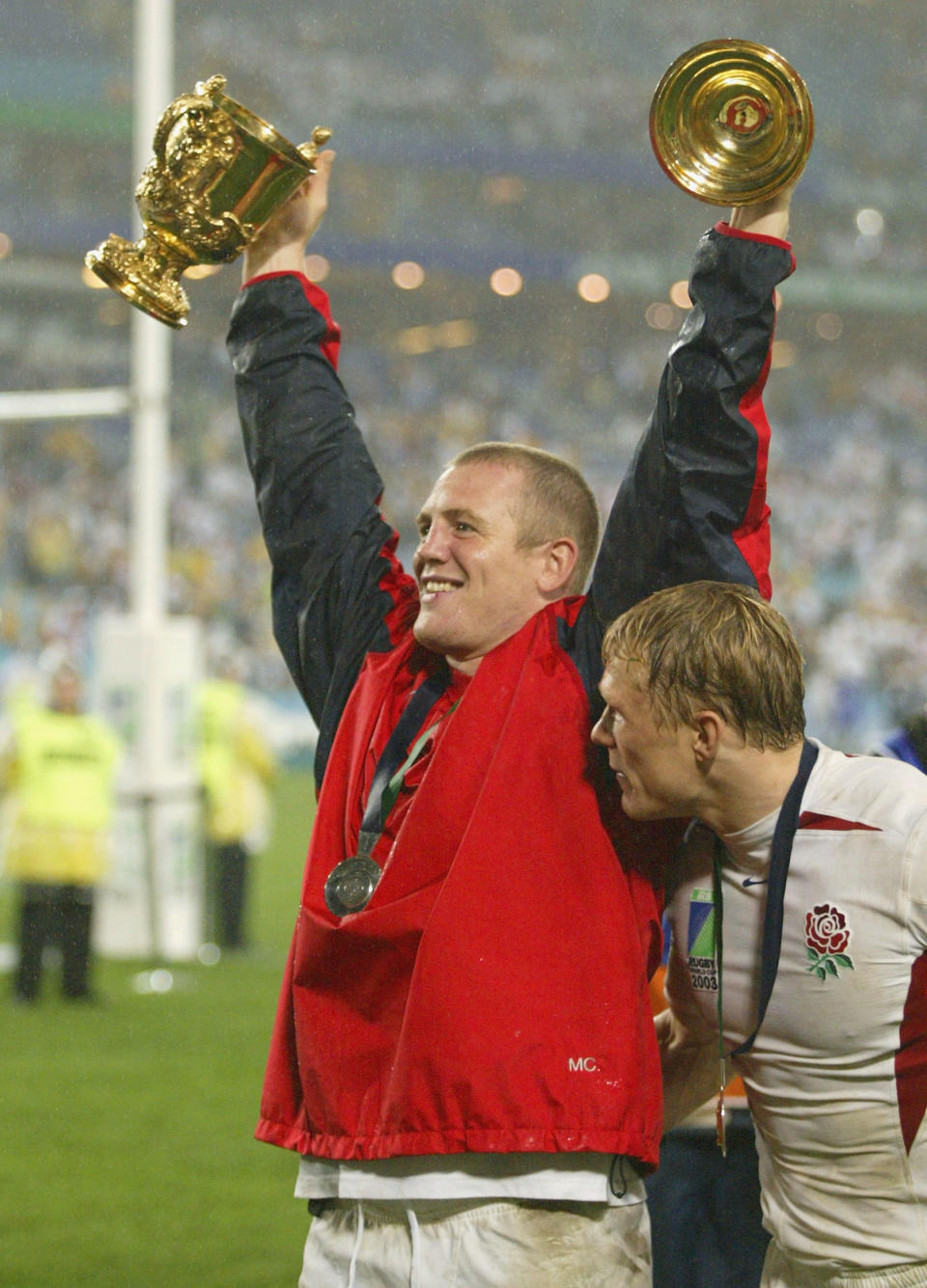 SYDNEY, AUSTRALIA - NOVEMBER 22:  Mike Tindall of England celebrates after England won the Rugby World Cup Final match between Australia and England at Telstra Stadium November 22, 2003 in Sydney, Australia. (Photo by Daniel Berehulak/Getty Images)