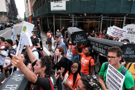 Protesters march and rally on the fifth anniversary of the death of Eric Garner in New York