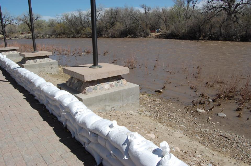 Although the Animas River is nowhere near peak flow, its rising water level already was just a few feet from the base of the flagpoles at All Veterans Memorial Plaza on Monday, April 17 in Farmington.