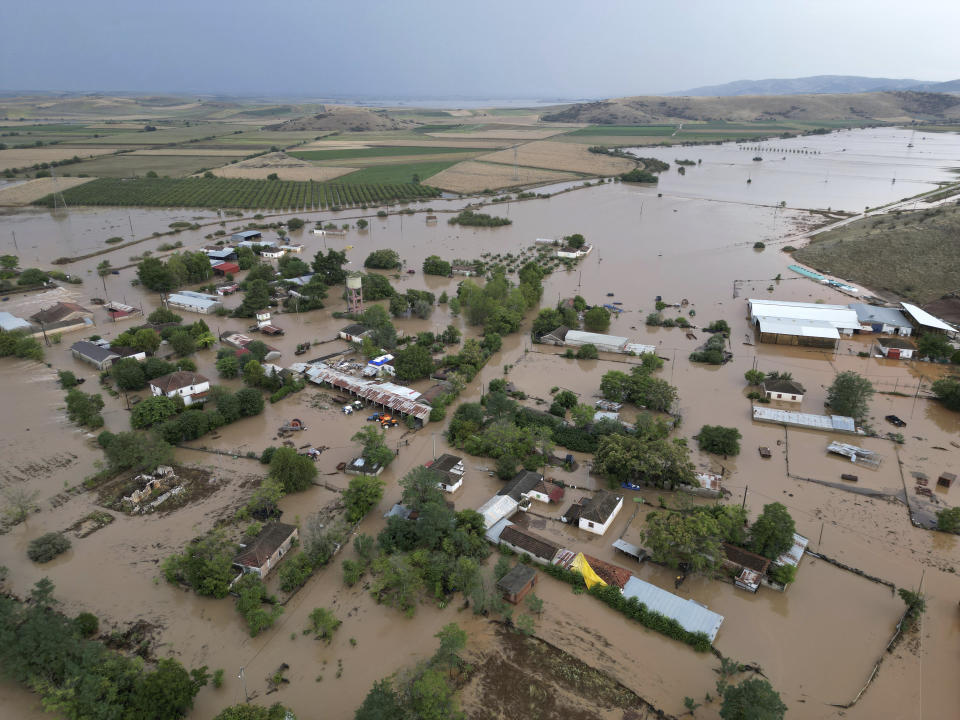 Floodwaters cover houses and farms after the country's record rainstorm in the village of Kastro, near Larissa, Thessaly region, central Greece, Thursday, Sept. 7, 2023. The death toll from severe rainstorms that lashed parts of Greece, Turkey and Bulgaria increased after rescue teams in the three neighboring countries recovered more bodies. (AP Photo/Vaggelis Kousioras)