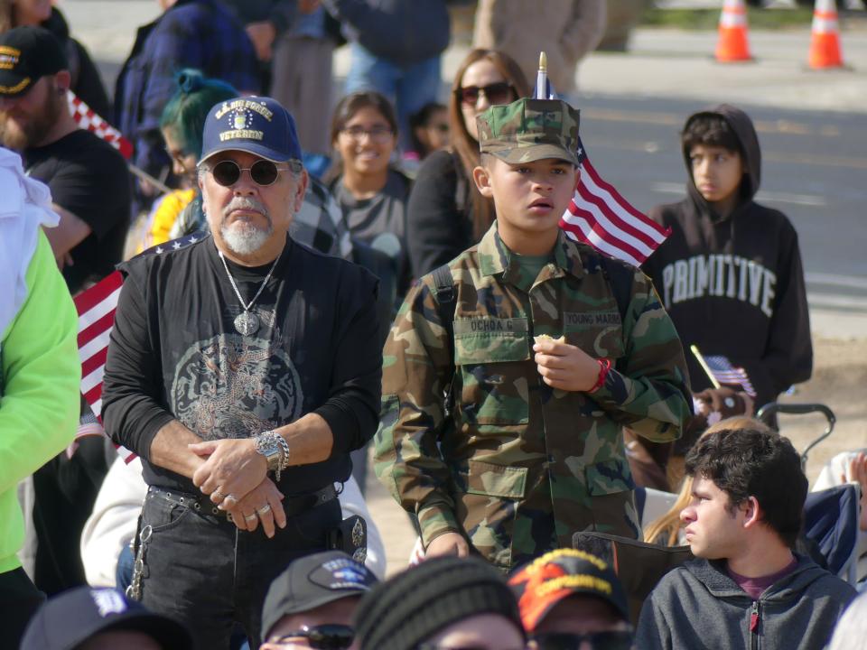 Waving flags and cheering words of support, many attended the 26th Annual Veterans Day Celebration on Friday.