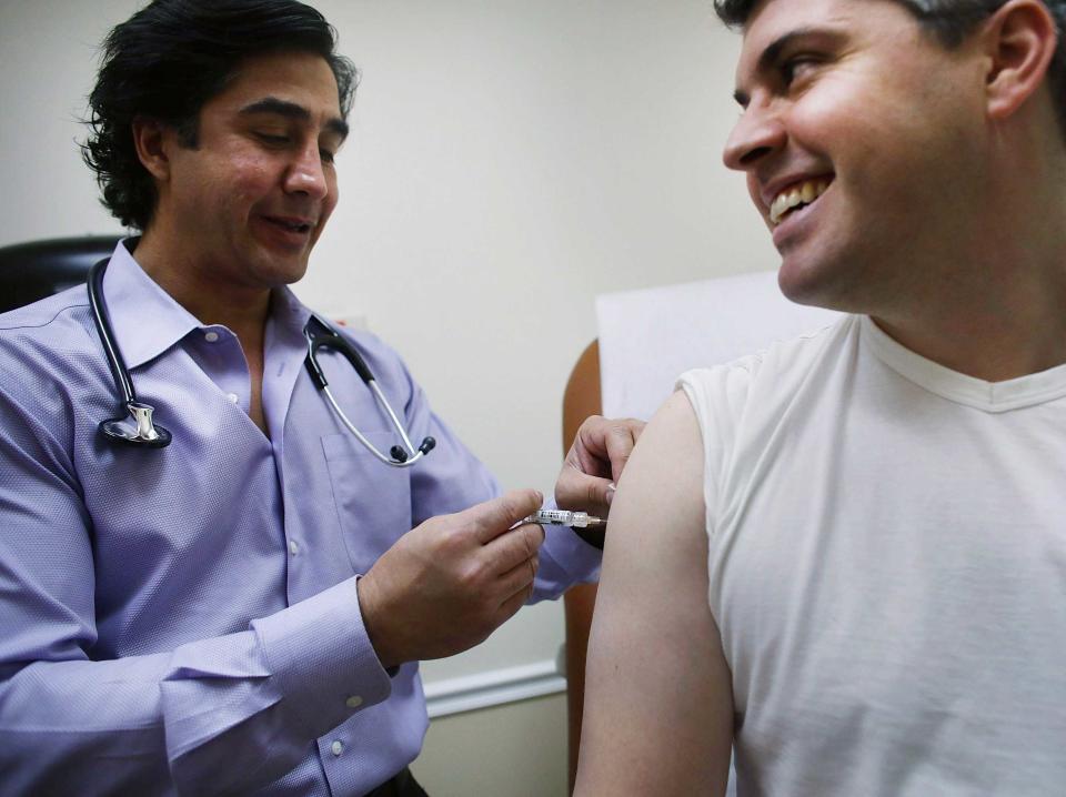 Doctor giving flu shot