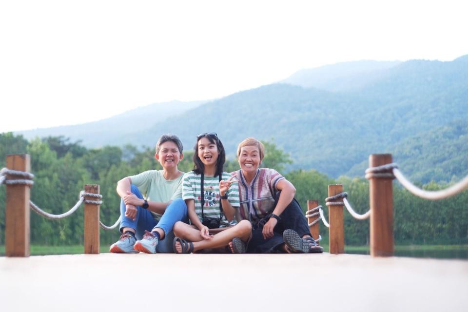 Matcha Phornin, right, with her long-term partner, left, and daughter