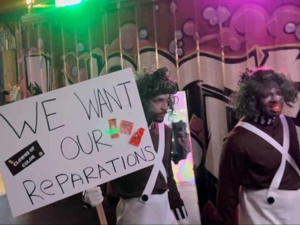 Comedy duo “Clowns of Colour” protested Willy Wonka for “reparations” at the Willy Wonka Experience in Downtown Los Angeles, California on 28 April. (Olivia Hebert)