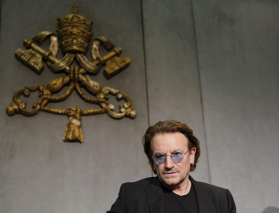 U2 rock band frontman Bono Vox arrives for a press conference he held at the end of a meeting with Pope Francis, at the Vatican, Wednesday, Sept. 19, 2018. (AP Photo/Andrew Medichini)