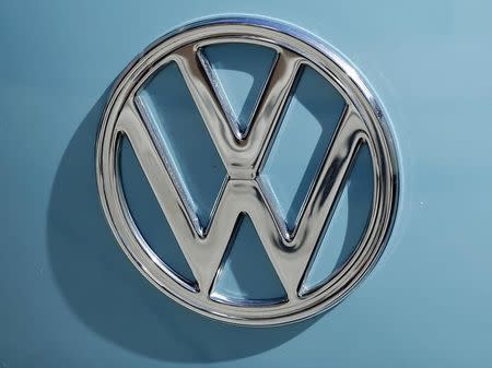 A Volkswagen logo is shown on the front of an old Volkswagen van in Encinitas, California September 29, 2015. REUTERS/Mike Blake