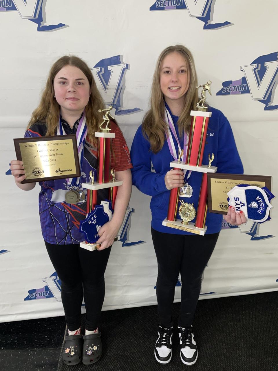 Fairport's Anna Lago, left, and Canandaigua's Sadie Erb each won individual Section V championships by bowling the high-series of their respective class tournaments. Lago won the Class A title and Erb rolled the highest series in Class B.