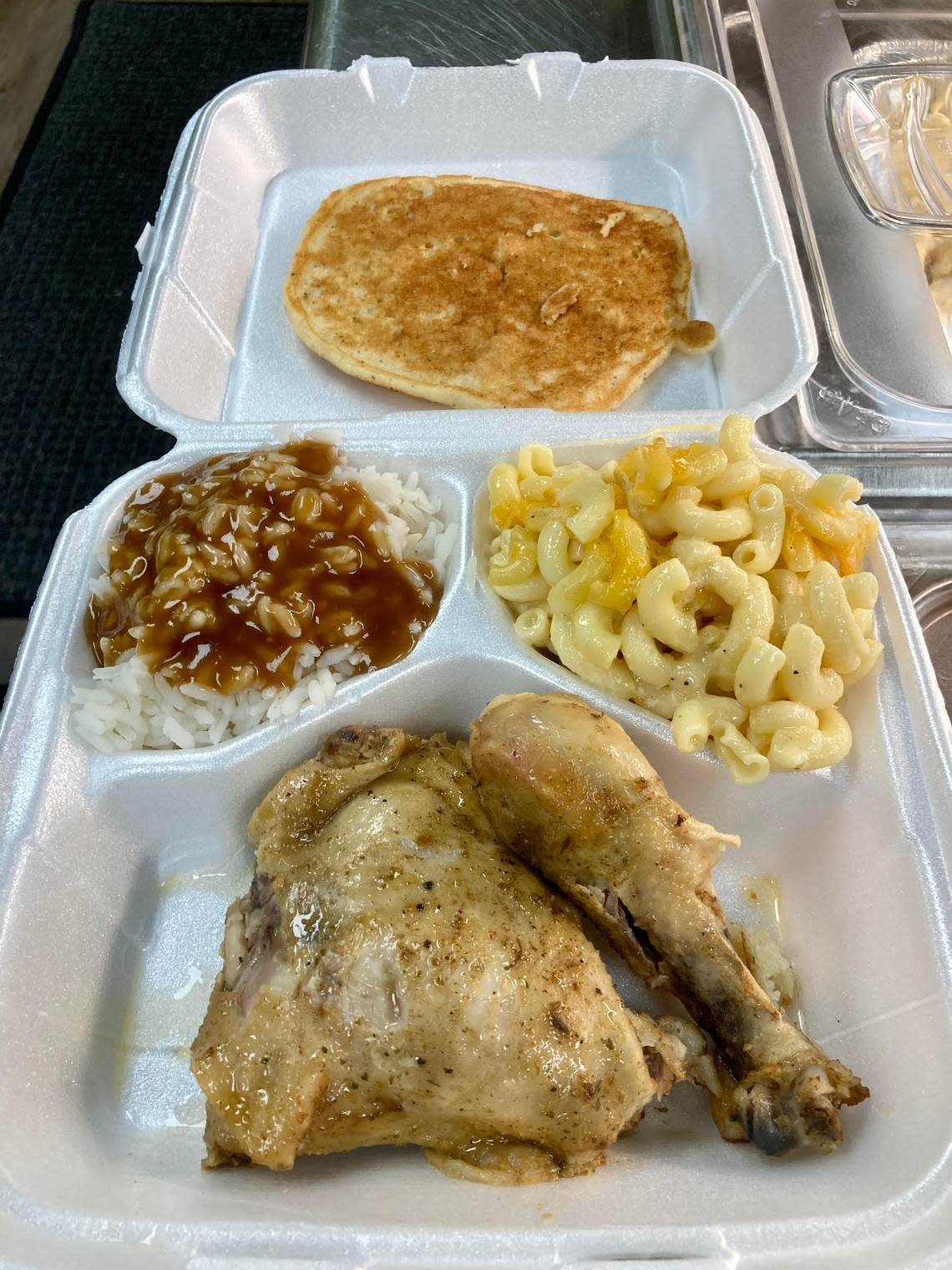Baked chicken, mac and cheese, rice with gravy and hoe cake cornbread from Hunni BJ’s Foodbar & Grill, a new cafeteria-style Southern and Cajun food restaurant at 504 Russell Parkway in Warner Robins.