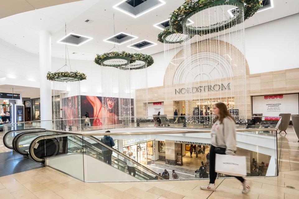 People shop the stores at Garden State Plaza in Paramus, NJ on Friday, November 18, 2022. 