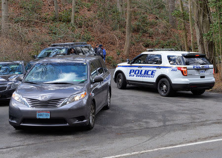 A vehicle with diplomatic license plates departs from a Russian compound in Upper Brookville, Long Island, New York, U.S., December 30, 2016. REUTERS/Rashid Umar Abbasi