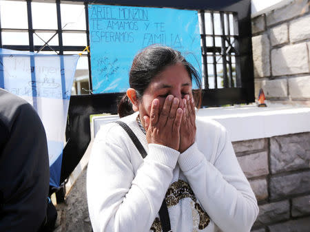 Elena Alfaro, sister of Cristian Ibanez, one of the 44 crew members of the missing at sea ARA San Juan submarine, reacts outside an Argentine naval base in Mar del Plata, Argentina November 22, 2017. REUTERS/Marcos Brindicci