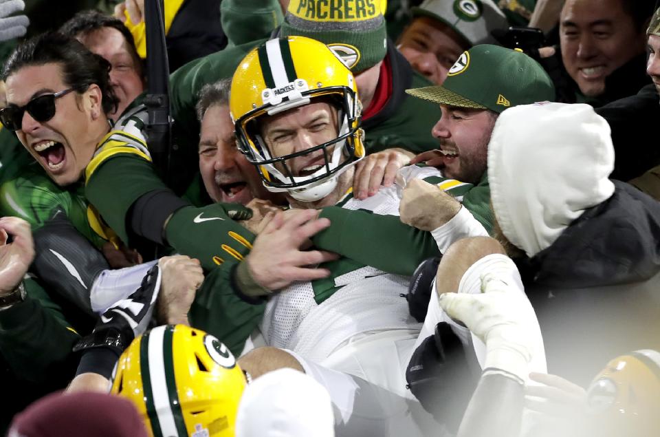 Green Bay Packers kicker Mason Crosby celebrates with a Lambeau Leap after kicking the winning field goal against the Detroit Lions on Oct. 14, 2019.