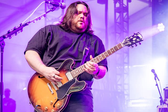 <p>Scott Legato/Getty </p> Wolfgang Van Halen plays a festival in Atlanta in October 2021.