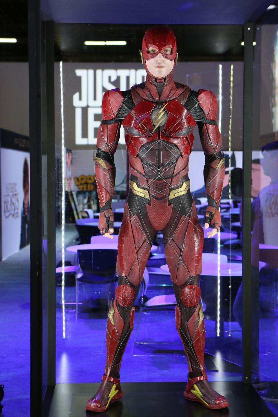 <p>Briefly glimpsed in <i>Batman v Superman</i>, Ezra Miller’s <em>Injustice</em>-inspired Speed Force-channeling supersuit is distinct from the TV show. (Credit: Warner Bros.) </p>