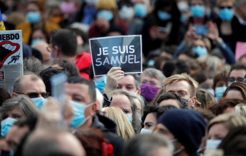 People pay tribute to beheaded teacher Samuel Paty in Paris