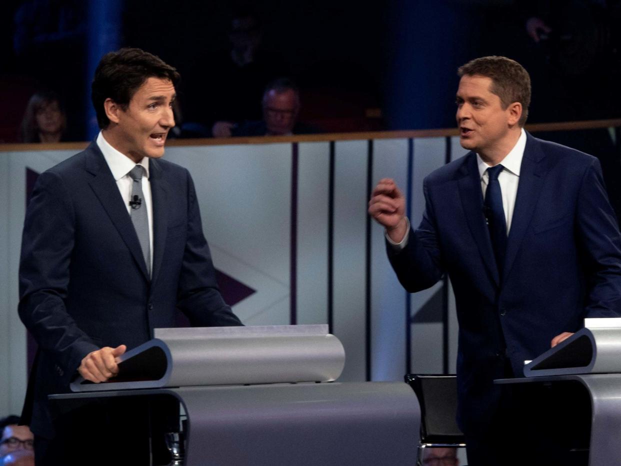 Liberal leader Justin Trudeau and Conservative leader Andrew Scheer take part in the Federal leaders French language debate: REUTERS
