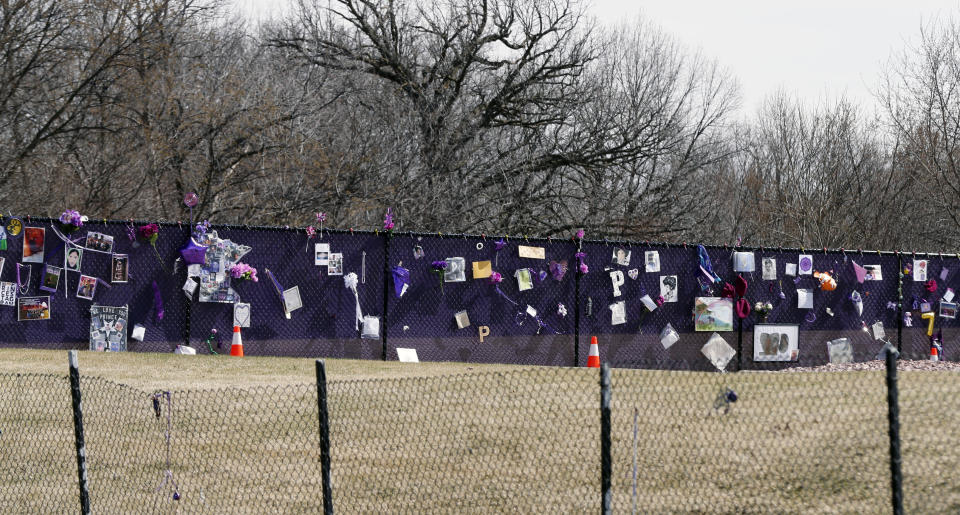 In this April 4, 2017 photo, a memorial fence at Prince's Paisley Park provides fans an opportunity to leave memorials in Chanhassen, Minn. The one-year anniversary of the rock star's death from an overdose will be marked April 21. (AP Photo/Jim Mone)