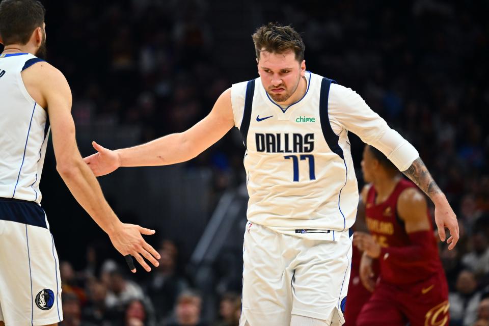 CLEVELAND, OHIO - FEBRUARY 27: Luka Doncic #77 of the Dallas Mavericks reacts after scoring during the fourth quarter against the Cleveland Cavaliers at Rocket Mortgage Fieldhouse on February 27, 2024 in Cleveland, Ohio. The Cavaliers defeated the Mavericks 121-119. NOTE TO USER: User expressly acknowledges and agrees that, by downloading and or using this photograph, User is consenting to the terms and conditions of the Getty Images License Agreement. (Photo by Jason Miller/Getty Images)