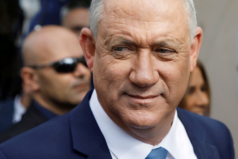 FILE PHOTO: Leader of Blue and White party, Benny Gantz looks on after voting at a polling station in Israel's national election in Rosh Ha'ayin, Israel