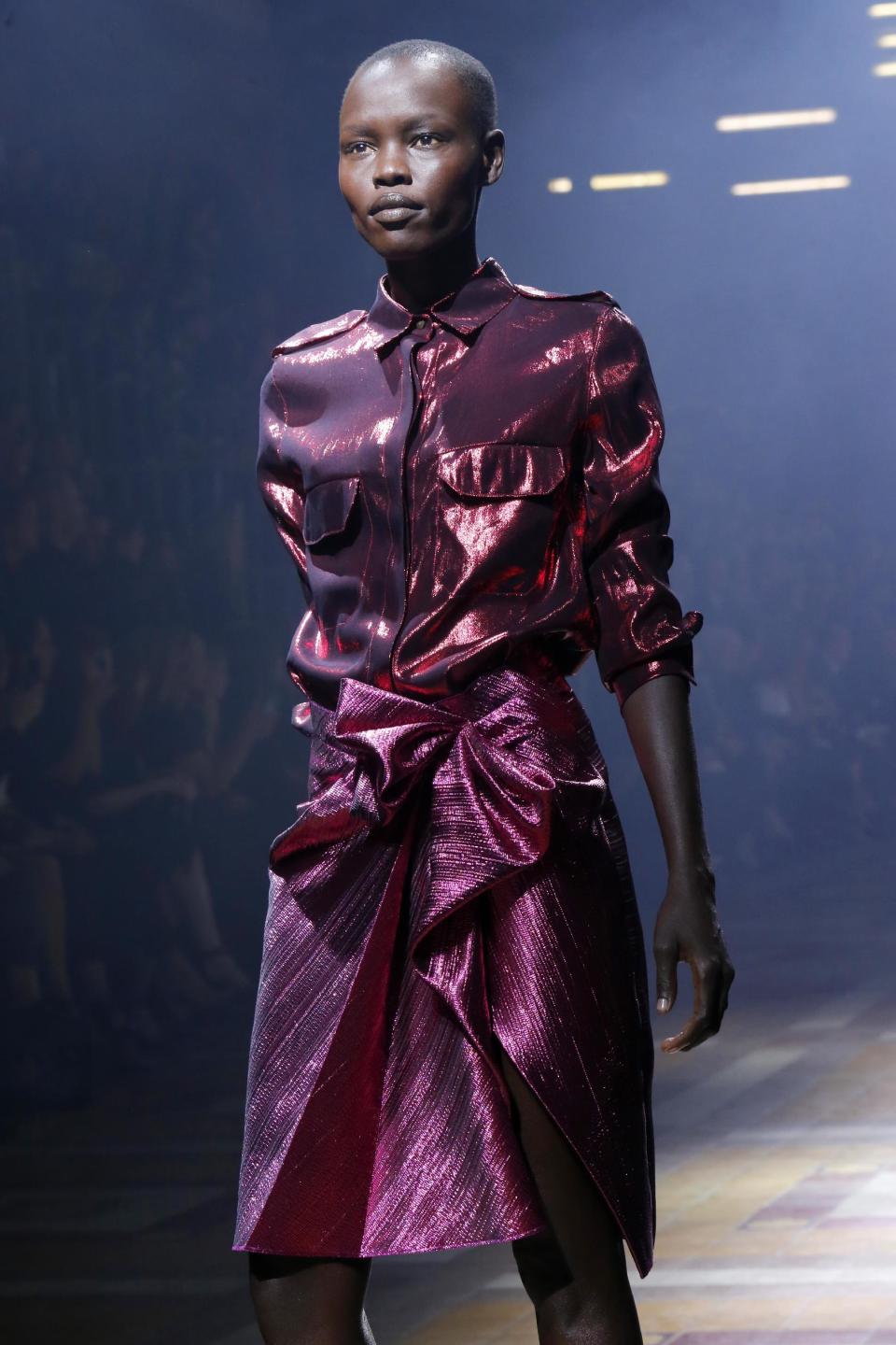 Model Alek Wek presents a creation as part of Lanvin's ready-to-wear Spring/Summer 2014 fashion collection, presented Thursday, Sept. 26, 2013 in Paris. (AP Photo/Jacques Brinon)
