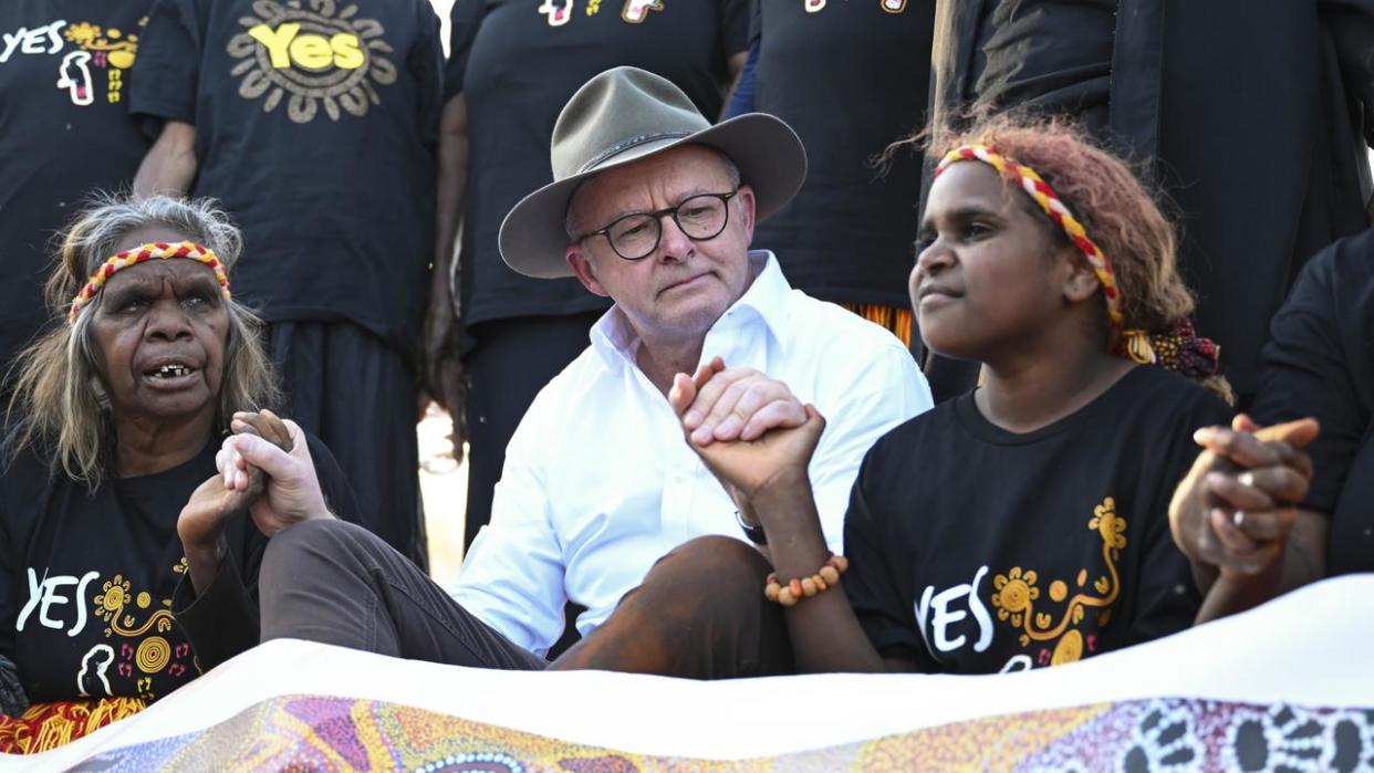 The Prime Minister Anthony Albanese was presented with his own copy of the Voice from the Heart statement in Uluru National Park today. Picture: NCA NewsWire / Martin Ollman