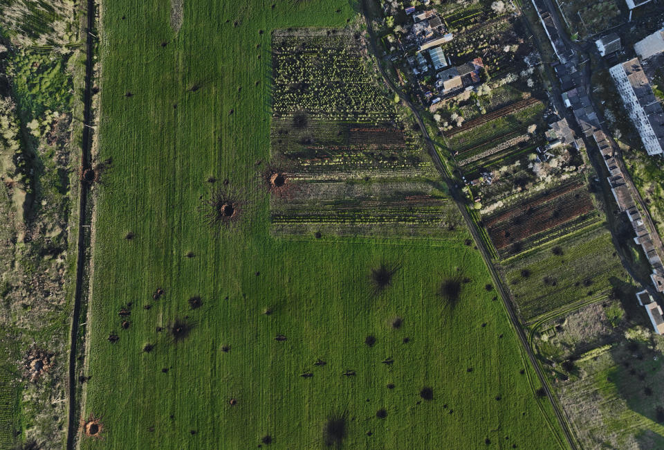 FILE - An aerial view of Bakhmut, the site of the heaviest battles with the Russian troops in the Donetsk region, Ukraine, Wednesday, April 26, 2023. Ukrainian President Volodymyr Zelenskyy said Sunday, May 21, 2023 that Russian forces weren't occupying Bakhmut, casting doubt on Moscow's insistence that the eastern Ukrainian city had fallen. The fog of war made it impossible to confirm the situation on the ground in the invasion’s longest battle, and the comments from Ukrainian and Russian officials added confusion to the matter. (AP Photo/Libkos, File)