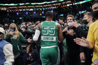 FILE - Boston Celtics' Joe Johnson is cheered by fans as he leaves the court after their win over the Cleveland Cavaliers in an NBA basketball game, Wednesday, Dec. 22, 2021, in Boston. It could be argued the untold MVP's of this season were the more than 100 players signed to short-term hardship contracts to fill in when almost every team was decimated by the Omicron variant and other virus issues in December and January. (AP Photo/Winslow Townson, File)