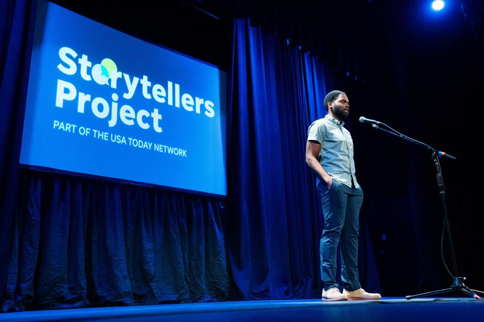 Kenny Gaskin tells a story during the Des Moines Register Storytellers Project's "Community" show Tuesday, Feb. 27, 2024, at Hoyt Sherman Place in Des Moines.