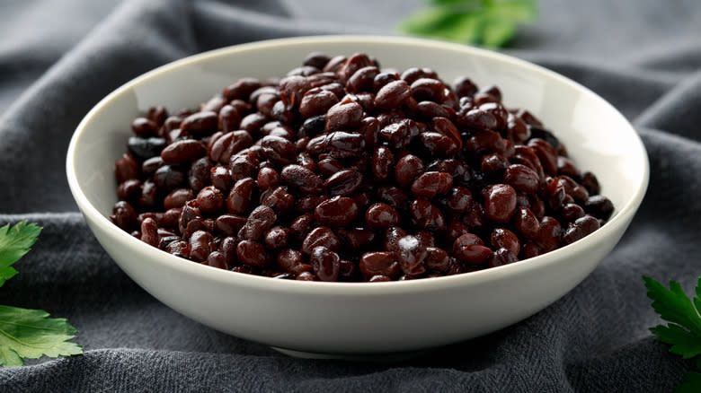 white bowl with black beans