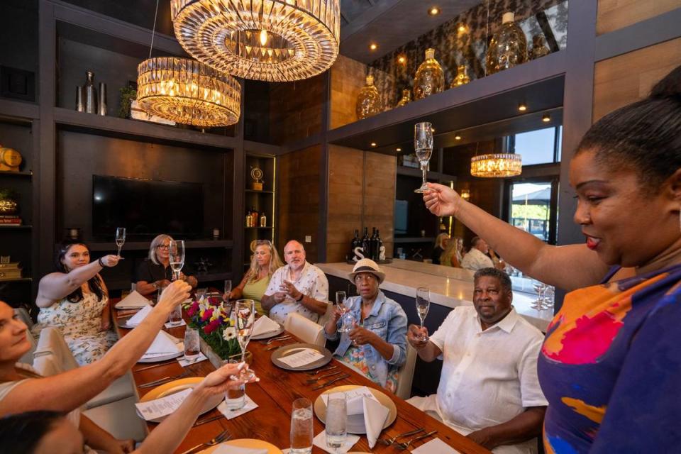 Enelalma tequila owner Melanie Shelby shares a toast with guests as she hosts a dinner and tequila pairing event at Sienna restaurant in Roseville earlier this month.