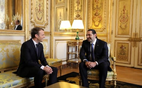 French President Emmanuel Macron and Saad al-Hariri, attend a meeting the Elysee Palace in Paris - Credit: REUTERS