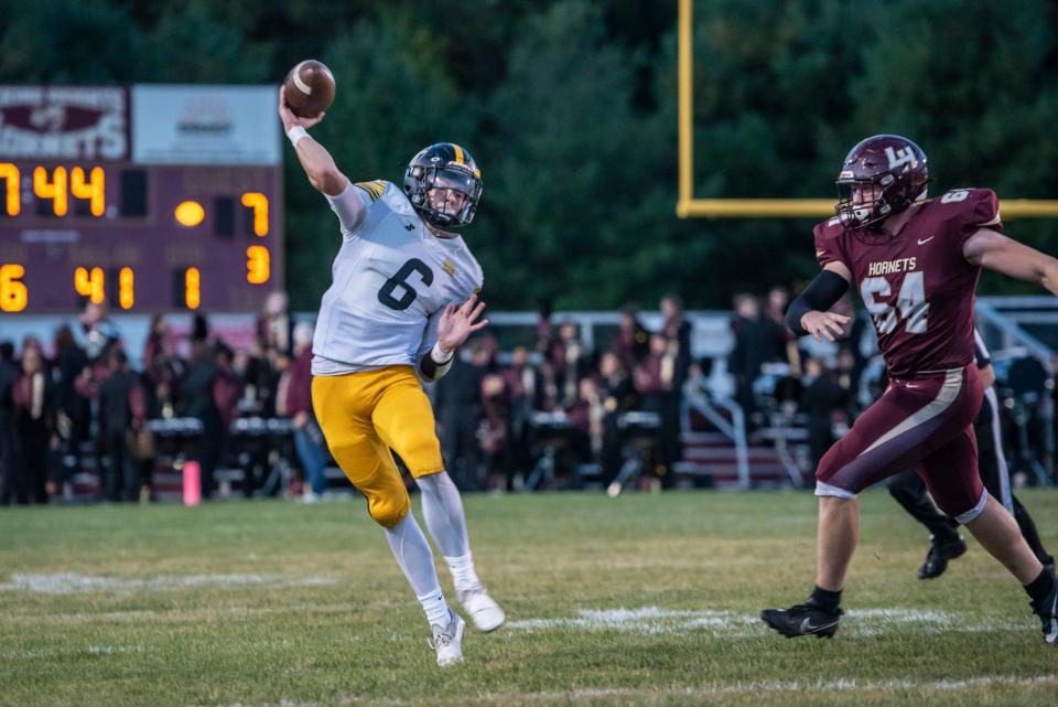 Watkins Memorial’s Drew Samsal throws on the run during a Week 8 game at Licking Heights. The sophomore has thrown for 17 TDs against just three INTs.