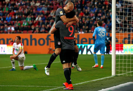 Football Soccer - FC Augsburg v Bayern Munich - German Bundesliga - WWK Arena, Augsburg, Germany - 29/10/16 - Bayern Munich's Robert Lewandowski and Arjen Robben celebrate a goal. REUTERS/Michaela Rehle