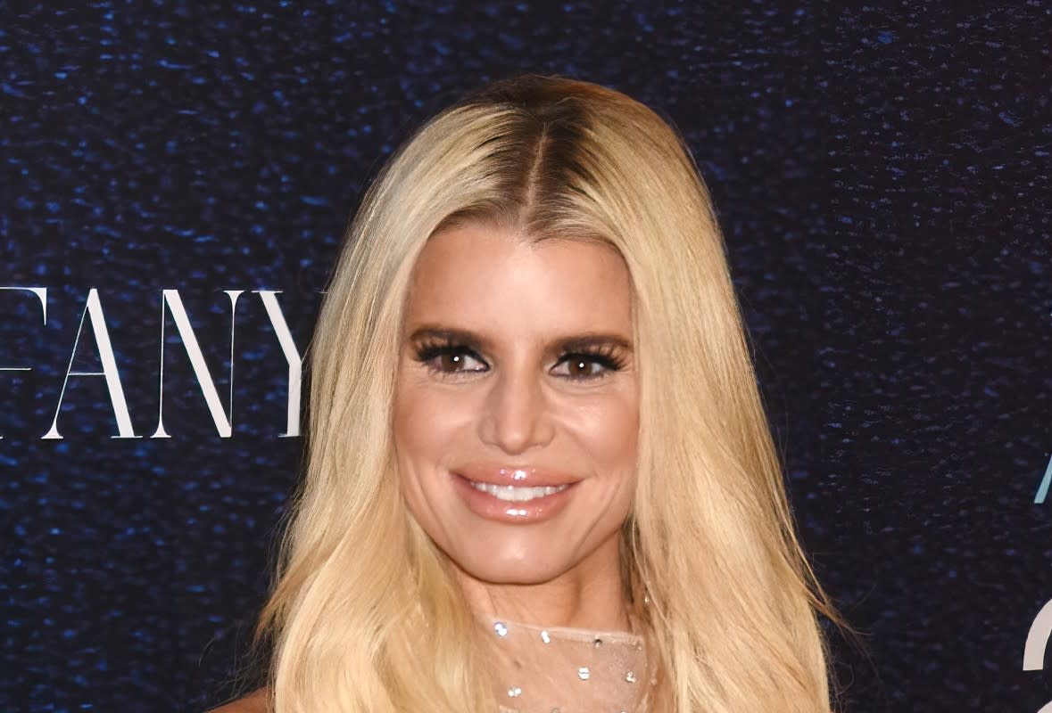 Jessica Simpson Dazzles in Sheer Beaded Dress for Red Carpet Appearance