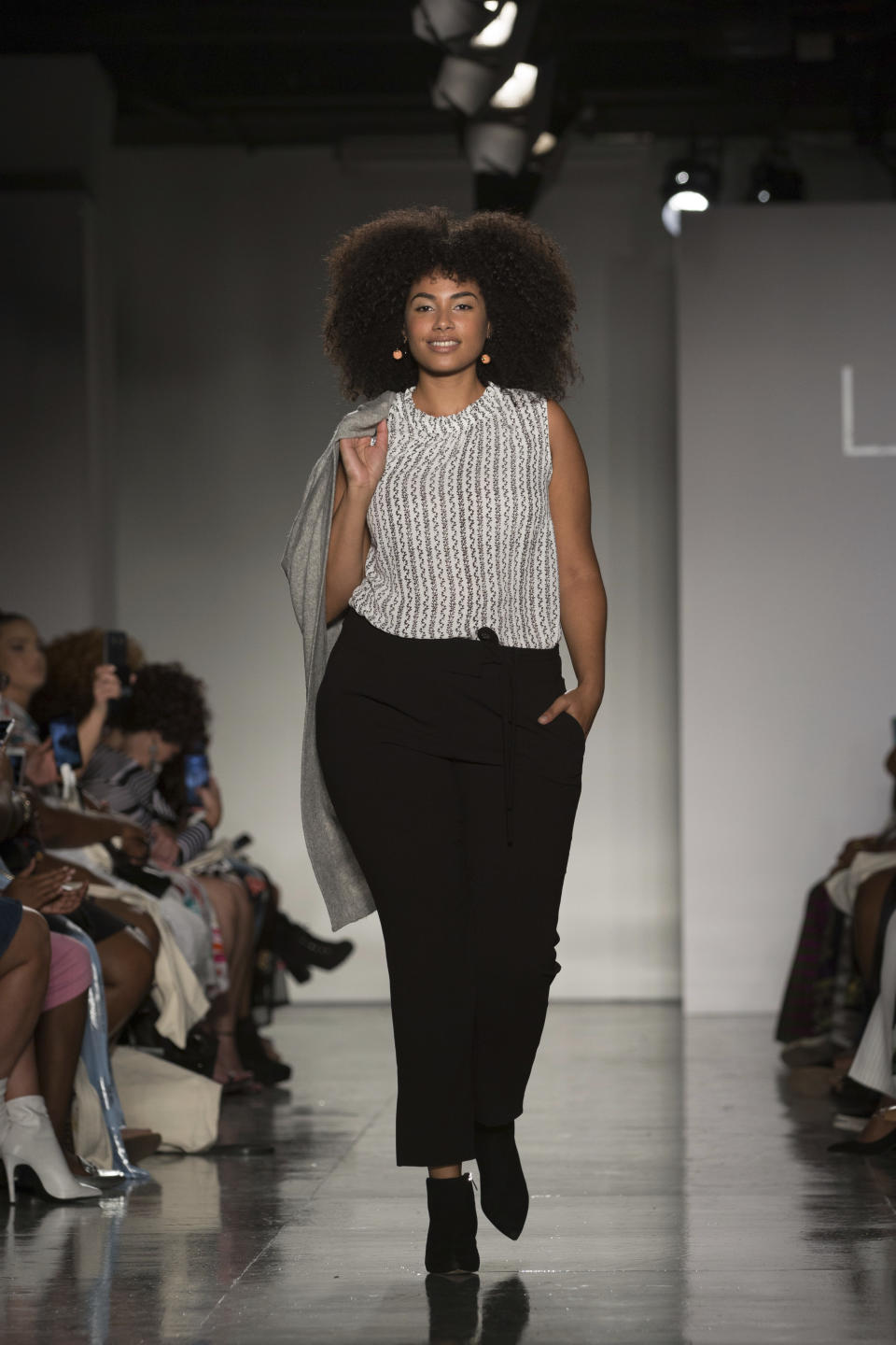 The Loft spring 2019 collection is modeled during Fashion Week Friday, Sept. 7, 2018, in New York. (AP Photo/Kevin Hagen).