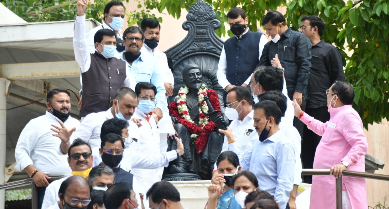 Suspended BJP MLAs protest at the Vidhan Bhavan in Mumbai on the first day of the Monsoon Session of the Maharashtra Assembly. Photo: Stringer/Yahoo India