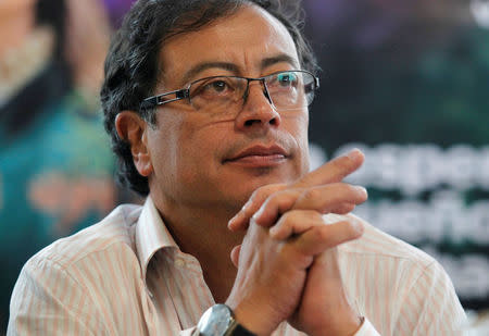FILE PHOTO: Colombian presidential candidate Gustavo Petro meets with supporters ahead of Sunday's presidential race, in Medellin, Colombia June 13, 2018. REUTERS/Fredy Builes