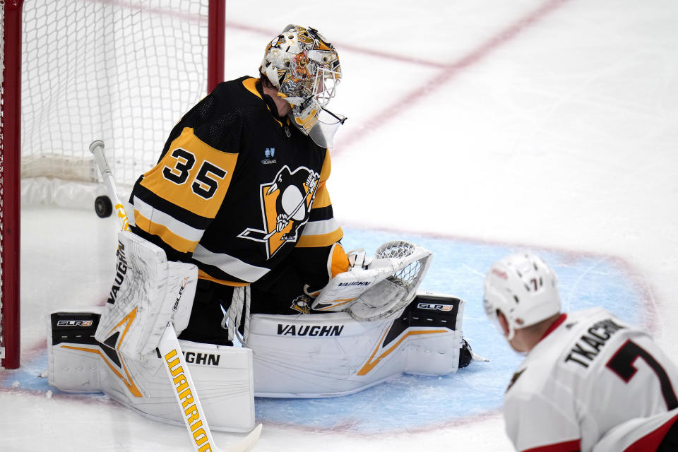 Ottawa Senators' Brady Tkachuk (7) gets a shot past Pittsburgh Penguins goaltender Tristan Jarry (35) for a goal during the first period of an NHL hockey game in Pittsburgh, on Saturday, Oct. 28, 2023. (AP Photo/Gene J. Puskar)