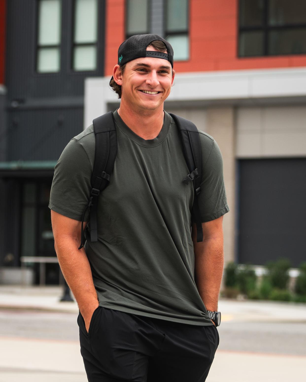 Worcester Red Sox pitcher Zach Penrod is all smiles as he walks into Polar Park ahead of a game last month.