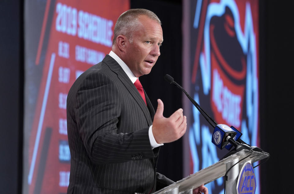 North Carolina State head coach Dave Doeren speaks during the Atlantic Coast Conference NCAA college football media day in Charlotte, N.C., Wednesday, July 17, 2019. (AP Photo/Chuck Burton)
