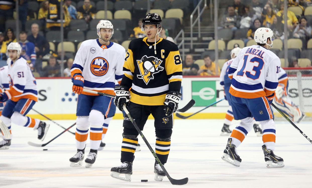Apr 16, 2019; Pittsburgh, PA, USA; Pittsburgh Penguins center Sidney Crosby (87) looks on during warm-ups before playing the New York Islanders in game four of the first round of the 2019 Stanley Cup Playoffs at PPG PAINTS Arena. Mandatory Credit: Charles LeClaire-USA TODAY Sports