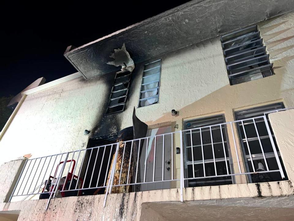 Miami firefighters rescued over a dozen people, including a child, from a three-story apartment complex that caught fire, officials said.