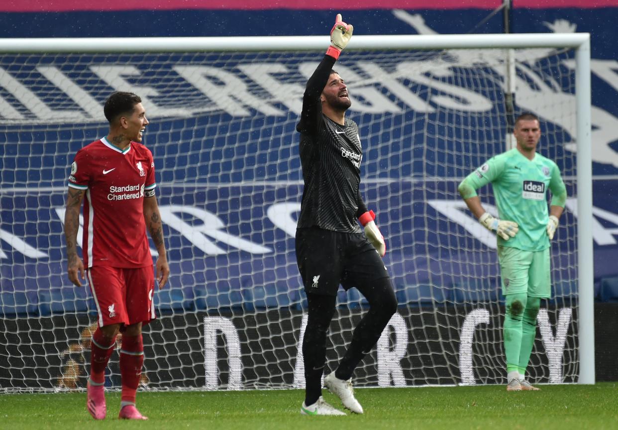 <p>Alisson celebrates scoring Liverpool’s winning goal</p> (Getty Images)