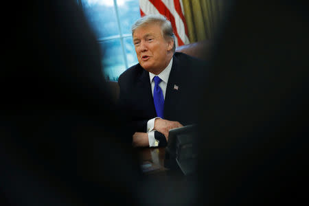 U.S. President Donald Trump looks on during a meeting with China's Vice Premier Liu He in the Oval Office at the White House in Washington, U.S., February 22, 2019. REUTERS/Carlos Barria