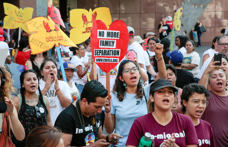 Protesters gather to show support for the Deferred Action for Childhood Arrivals (DACA) program recipient during a rally outside the Federal Building in Los Angeles, California, U.S., September 1, 2017. REUTERS/Kyle Grillot