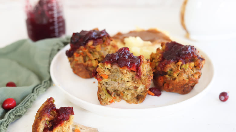 turkey meatloaf muffins on white plate with tea towel