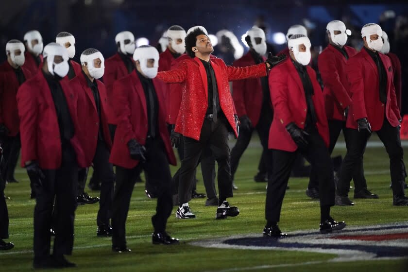 The Weeknd performs during the halftime show of the NFL Super Bowl 55 football game between the Kansas City Chiefs and Tampa Bay Buccaneers, Sunday, Feb. 7, 2021, in Tampa, Fla. (AP Photo/Ashley Landis)