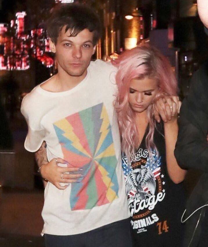 Louis was supported by his younger sister Lottie.
