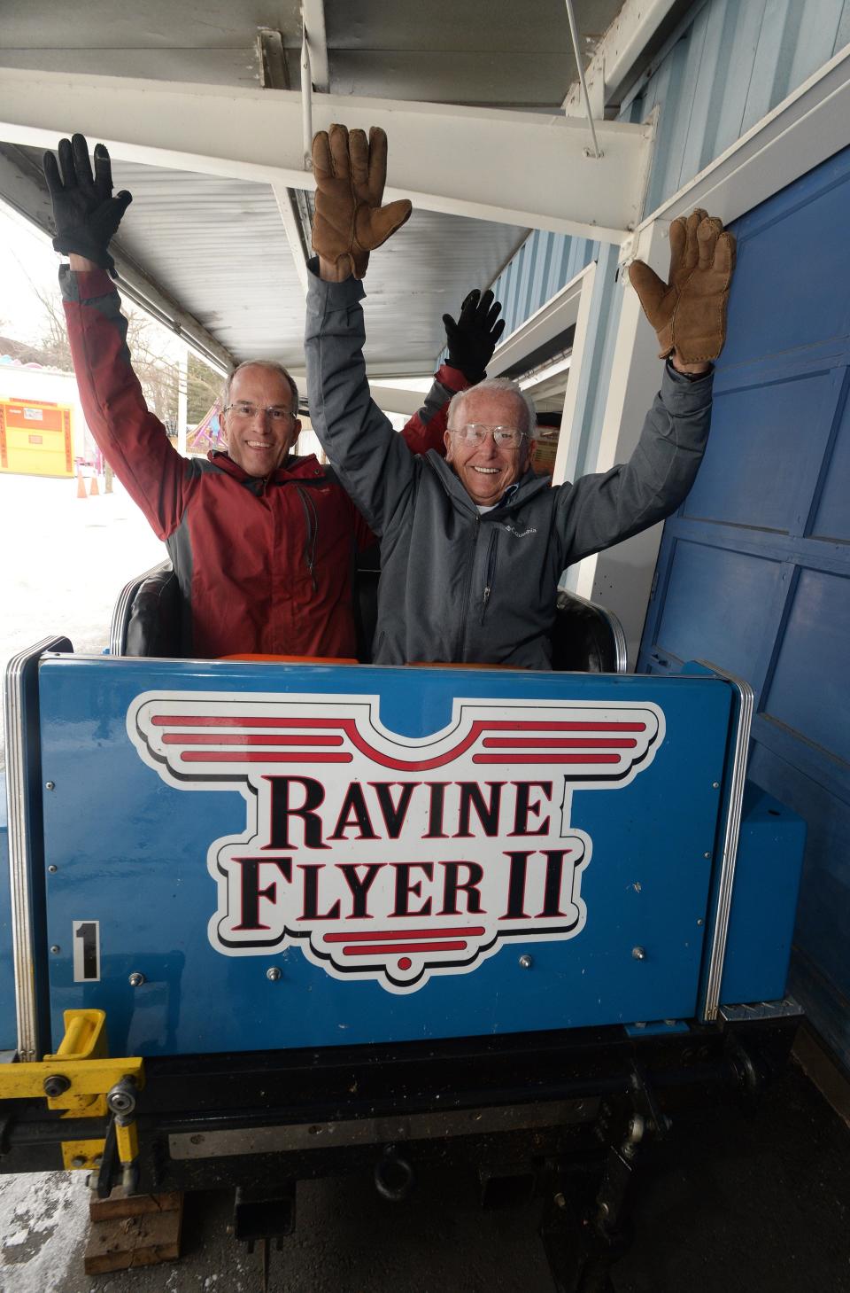 Steve Gorman, left, president of Waldameer Park & Water World and park owner Paul Nelson, Gorman's father-in-law, sit in a car of Waldameer's Ravine Flyer II roller coaster car on Jan. 16, 2019, when the popular thrill ride was in winter storage.