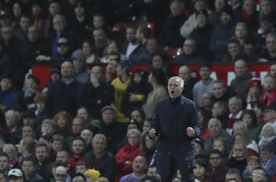 Manchester United's manager Jose Mourinho reacts and gestures to his players during their English Premier League soccer match between Manchester United and Newcastle United at Old Trafford in Manchester, England, Saturday, Oct. 6, 2018. (AP Photo/Jon Super)